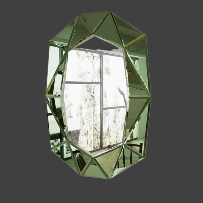 Green geometric mirror on a white wall with decorative elements.